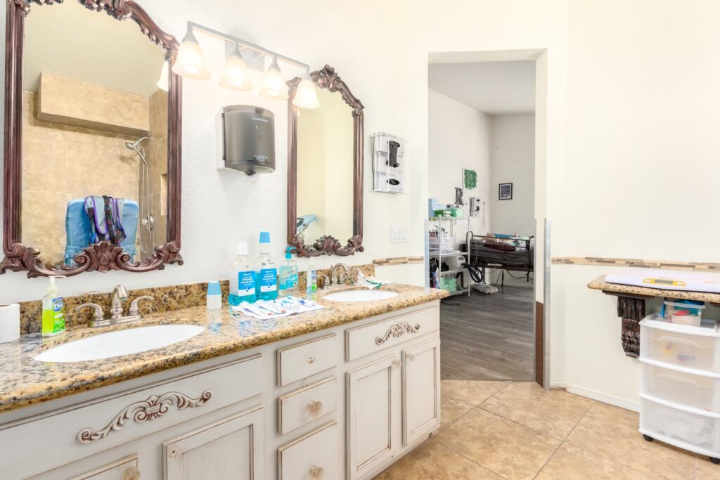 Elegant bathroom with dual sinks and mirrors.