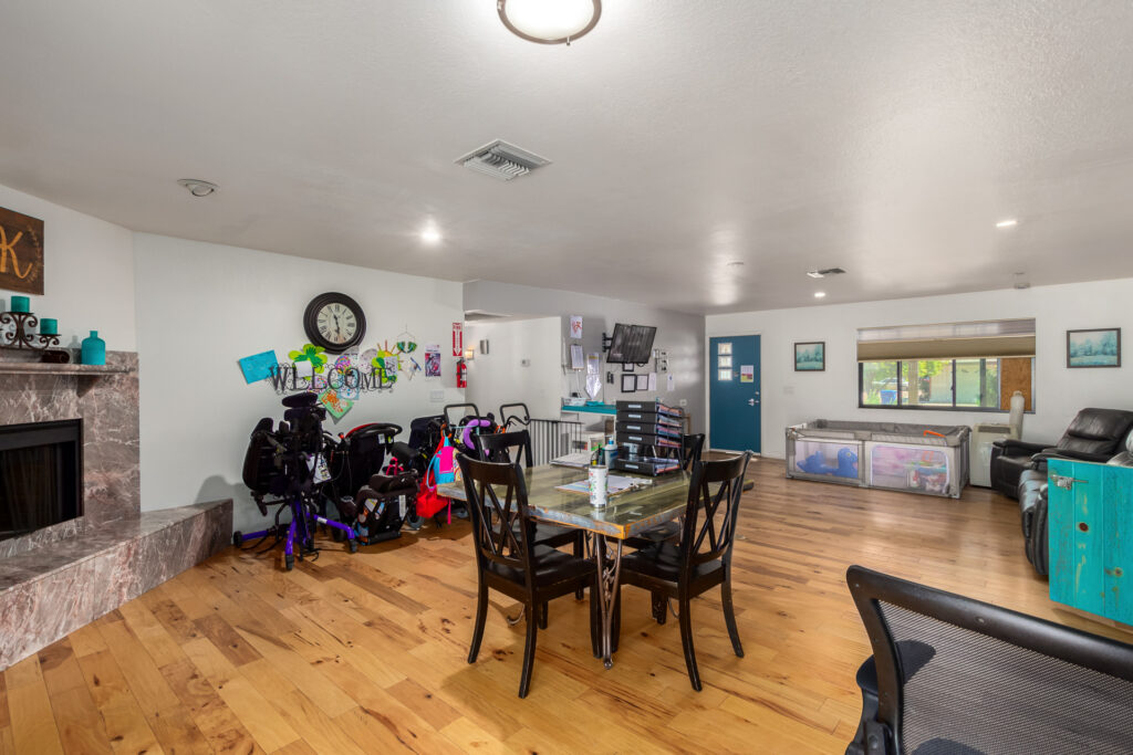 Cozy interior with dining and play area.